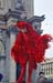 A red mask with long strings on the wind at the base of St. Marco's steeple - Masks at the Venice Carnival, JBLArts photography