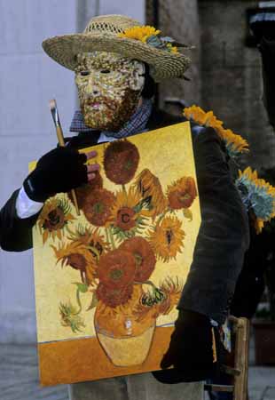 A mask with Vincent Van Gough sunflower painting and straw hat - Masks at the Venice Carnival, JBLArts photography