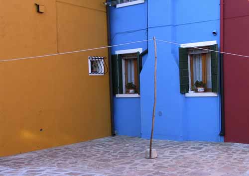 A court corner with ochre, blue and red walls (with perch) - Burano in Venice, JBLArts photography
