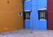 A court corner with ochre, blue and red walls (with perch) - Burano in Venice, JBLArts photography
