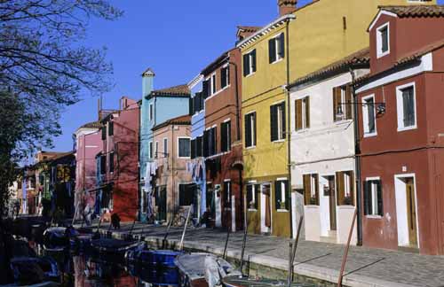 A foreshortened view of a Burano's canal with its coloured houses - Burano in Venice, JBLArts photography