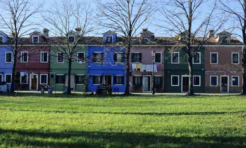 Many terrace houses of different colours with grass - Burano in Venice, JBLArts photography