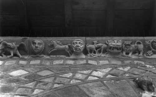 Sculptures on the arches of the cloister: shepherdess and worried knight - Le Puy En Velay, France, JBLArts photography